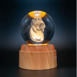 Lampara bola de cristal LED diseño capibara tortuga base giratoria 8 cm